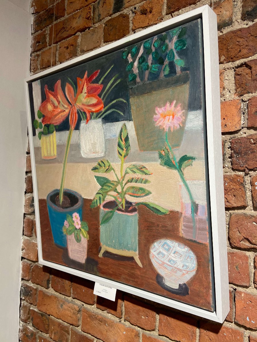 Amaryllis and Pot Plant by Jo Sharpe, an original still life painting in a white frame