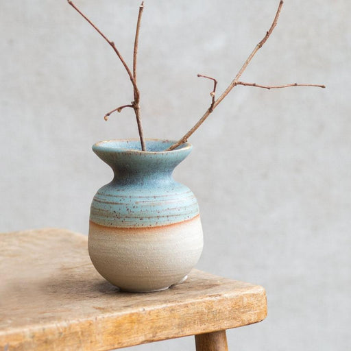 Ceramic Posy Vase by Kirsty Adams, a beige stoneware vase with green glaze at the opening and a gold rim. | Handmade studio ceramics for sale at The Biscuit Factory Newcastle